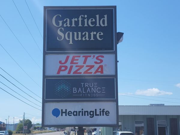 Garfield Square multi-tenant pylon sign with tenant panels